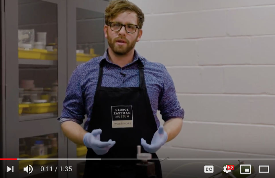 Man discussing photographic techniques in an online video