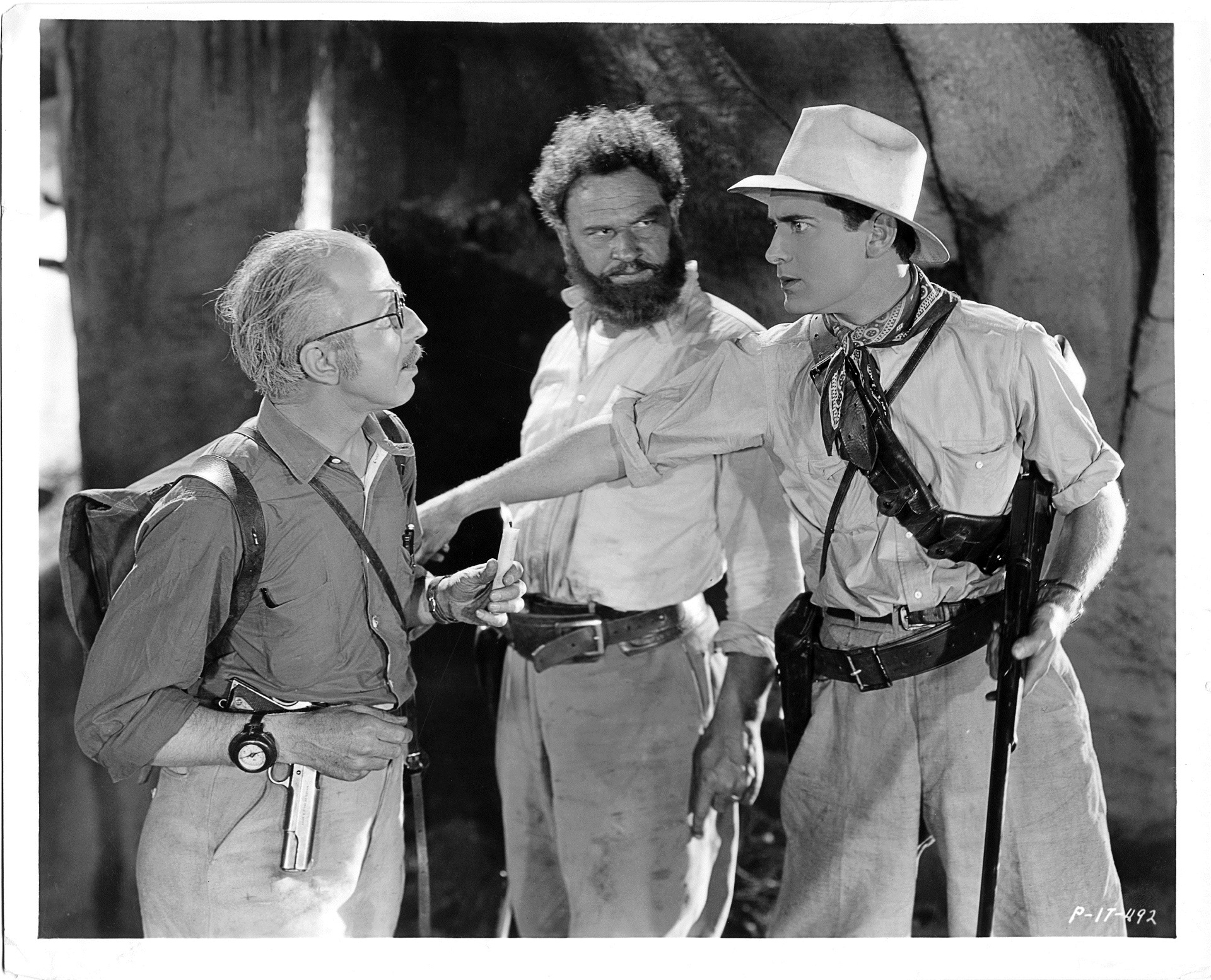 Photograph from the film, the lost world, of three men arguing