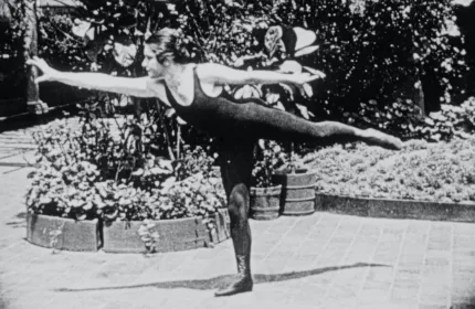 Woman exercising as part of 1920s film