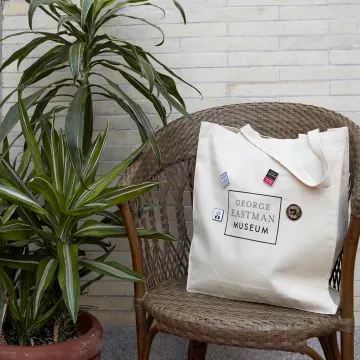 Tote bag with museum pins on it
