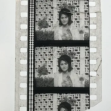 35mm film frames depicting woman looking at camera.