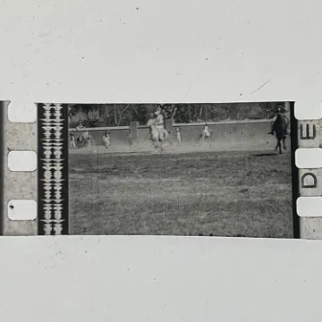 35mm film fragment depicting a man on a horse.