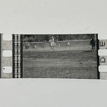 35mm film fragment depicting a man on a horse.