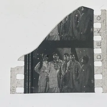 35mm film frames depicting man with friends