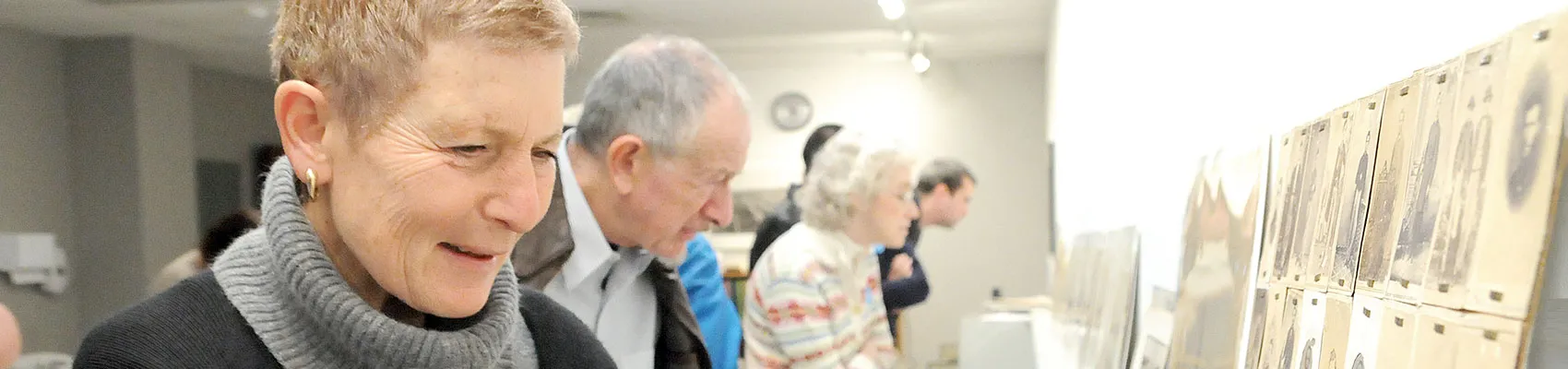 Individual looking at photograph