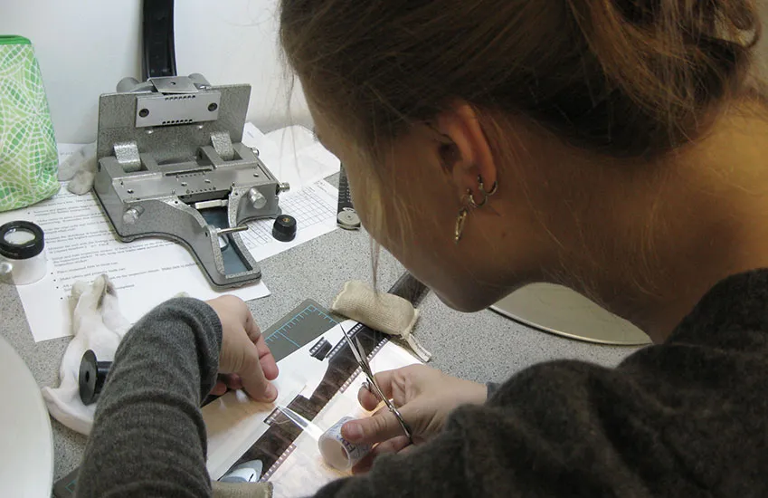 Students inspecting a print