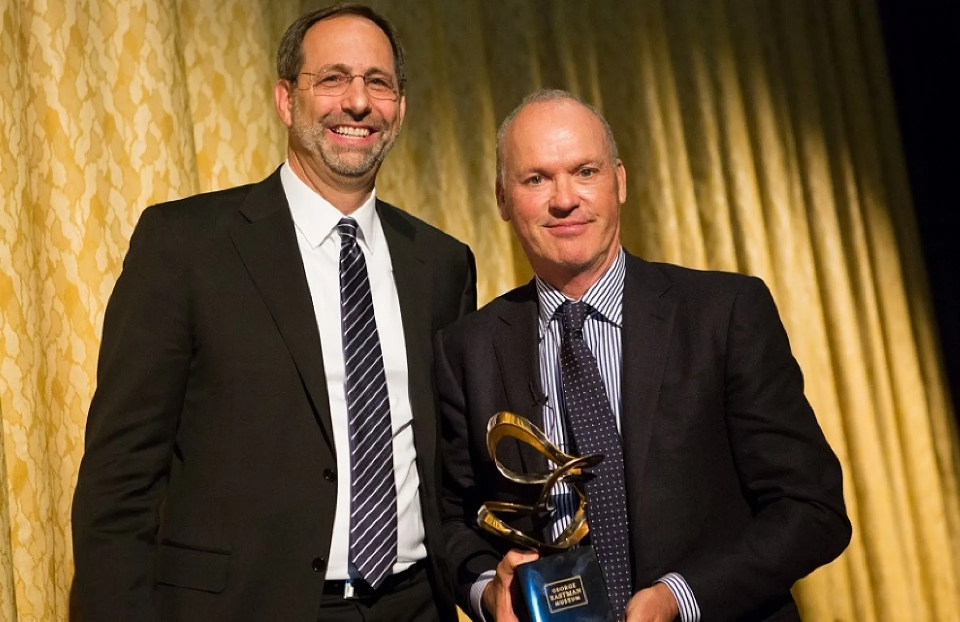 Michael Keaton, Eastman award honoree, and Steven Schwartz, board of trustee chair