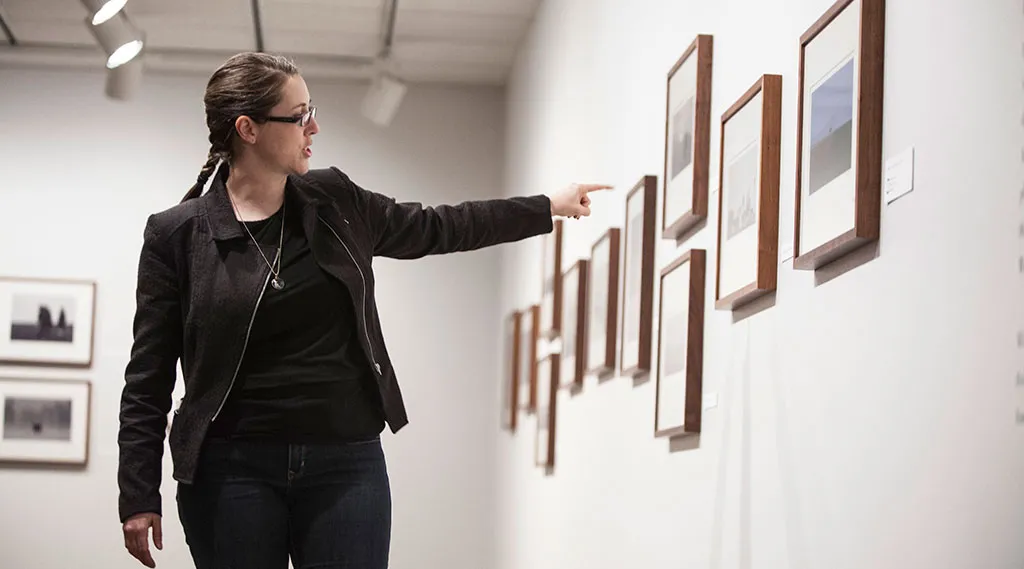 Curator leading a tour