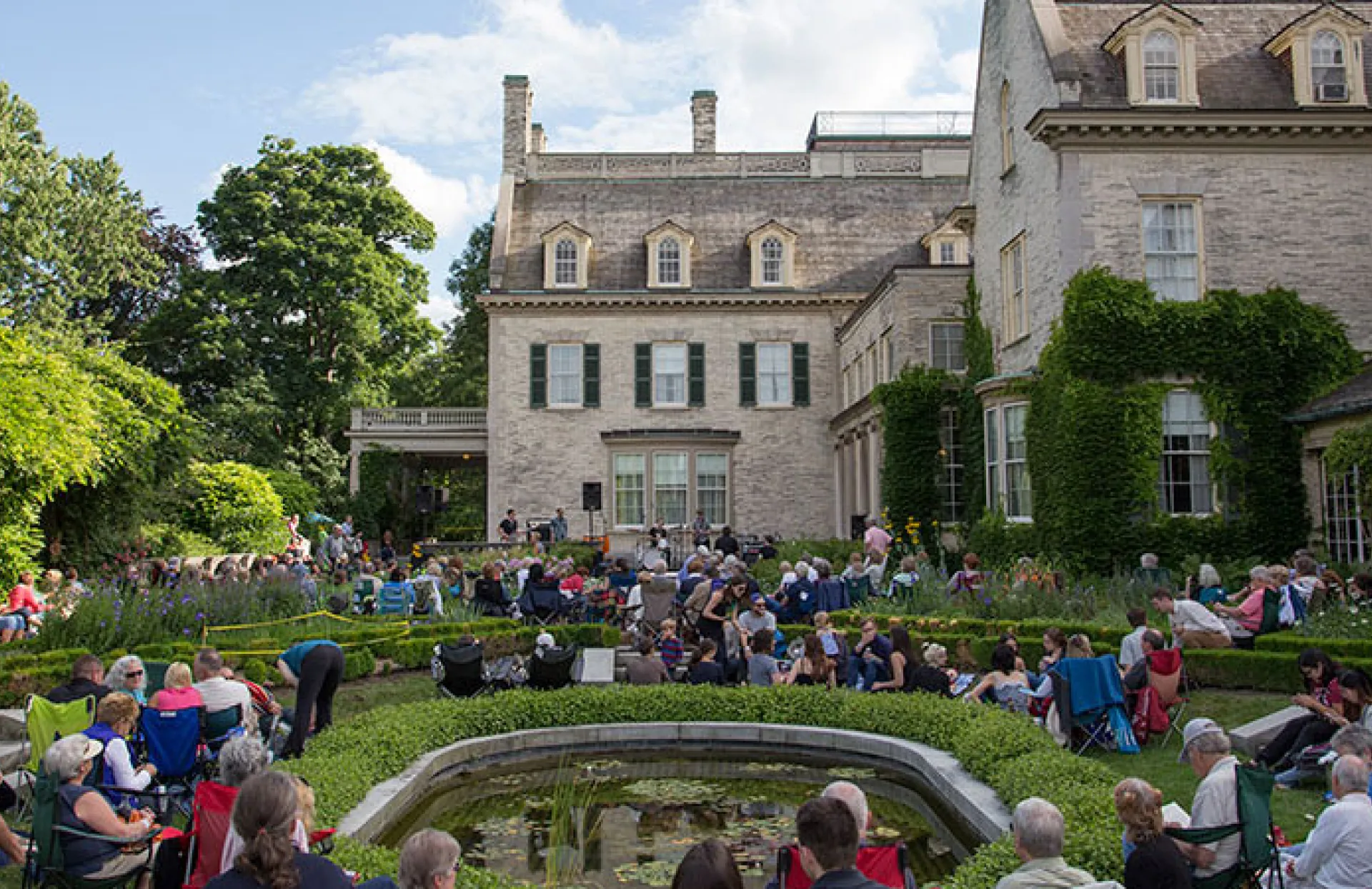 View of the mansion from the Townson Terrace garden during a garden concert