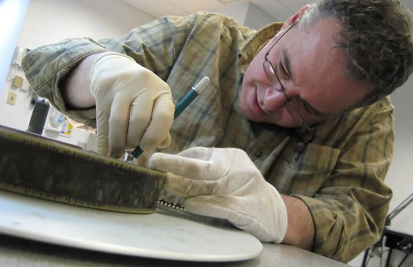 Students inspecting a print