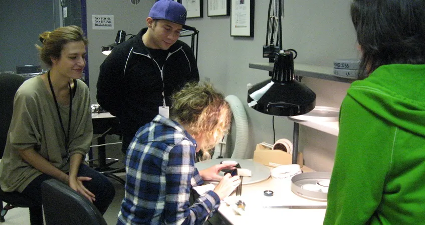 Students inspecting a print