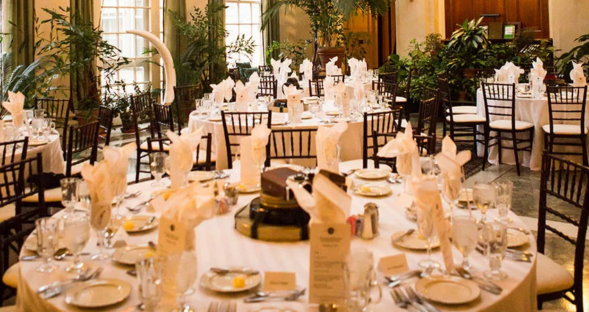 Table setting in the conservatory for an event