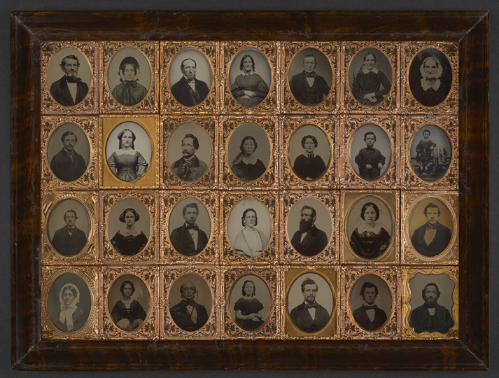 Unidentified, Frame containing 28 individual portraits of men, women, and children, ca. 1869. Ambrotypes, tintypes, and pannotypes in wooden frame. George Eastman Museum, gift of Mrs. Alden Scott Boyer, ex collection Alden Scott Boyer, 1954
