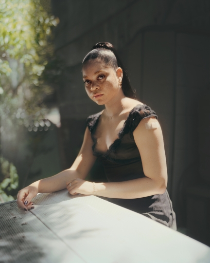 Portrait of a woman sitting outside