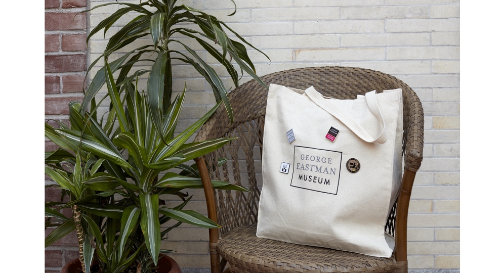 Tote bag with museum pins on it