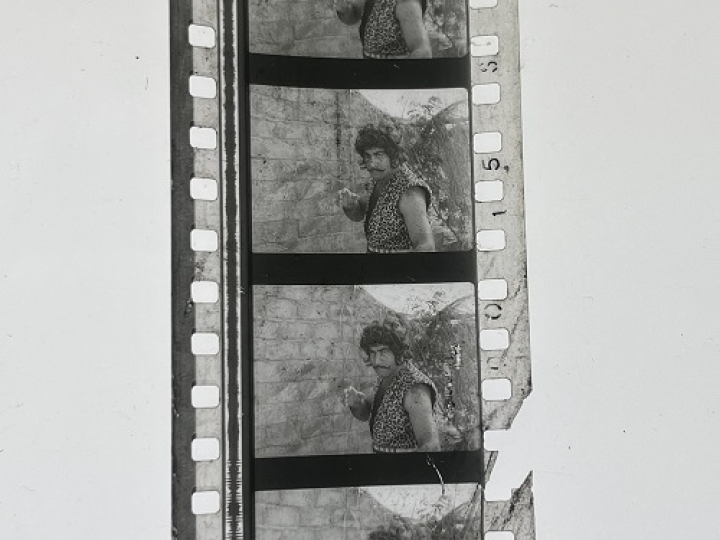 35mm film frames depicting man in leopard print.