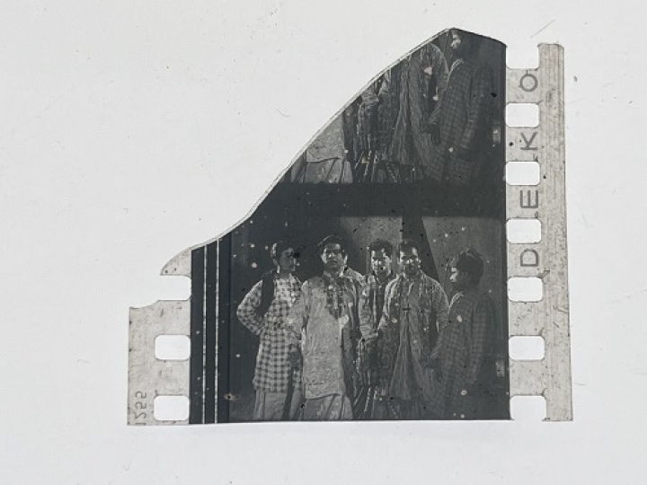 35mm film frames depicting man with friends