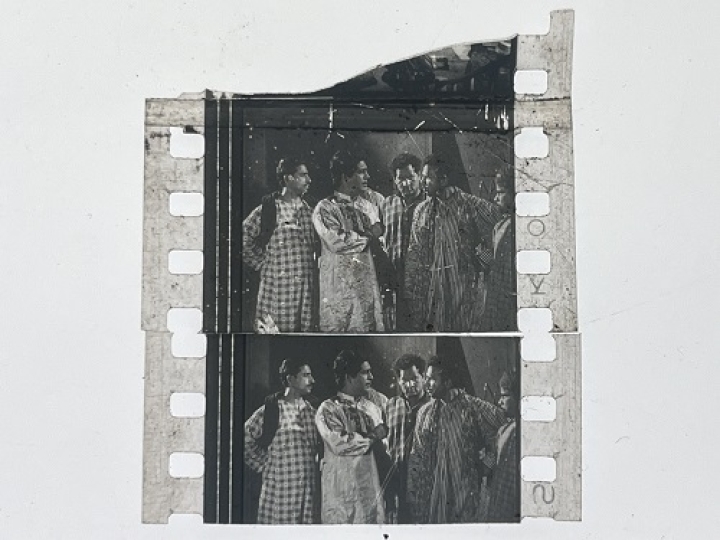 35mm film frames depicting man with friends.