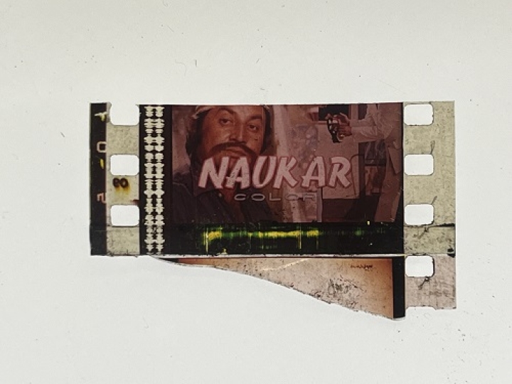 35mm film frame depicting title "Noukar".