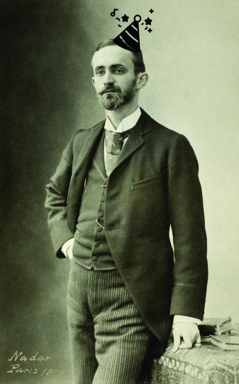 Young George Eastman with a photoshopped birthday hat on his head