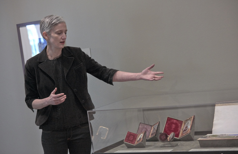 Heather Shannon giving a tour of an exhibition