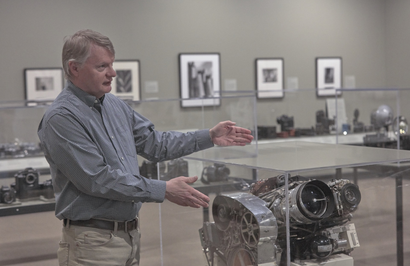 Todd Gustavson giving a tour of an exhibition