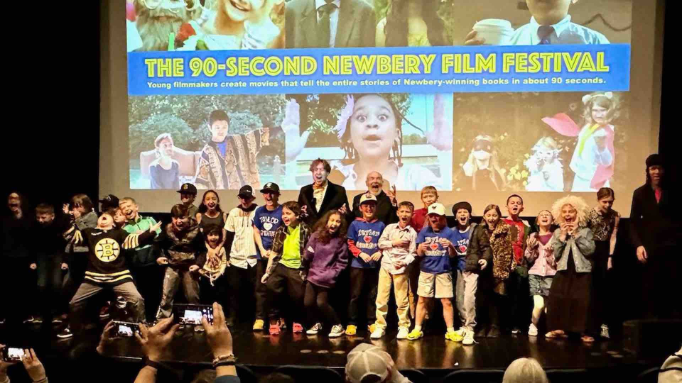 Filmmakers standing on stage at the Dryden Theatre during the 90-Second Newbery Film Festival