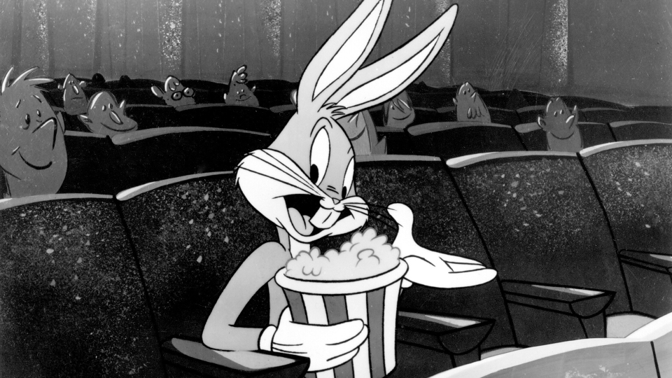 Bugs Bunny sitting in a movie theater