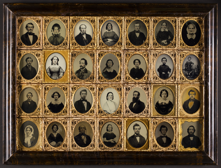 Unidentified, Frame containing 28 individual portraits of men, women, and children, ca. 1869. Ambrotypes, tintypes, and pannotypes in wooden frame. George Eastman Museum, gift of Mrs. Alden Scott Boyer, ex collection Alden Scott Boyer, 1954.
