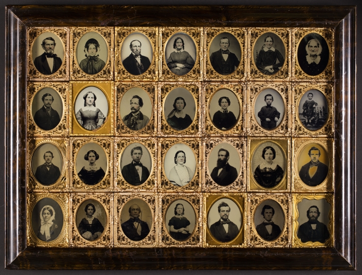 Unidentified, Frame containing 28 individual portraits of men, women, and children, ca. 1869. Ambrotypes, tintypes, and pannotypes in wooden frame. George Eastman Museum, gift of Mrs. Alden Scott Boyer, ex collection Alden Scott Boyer, 1954.