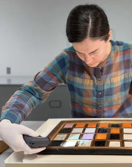 Emily Phoenix working on the object she will discuss in her talk.