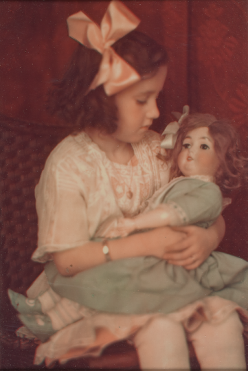 Girl with doll