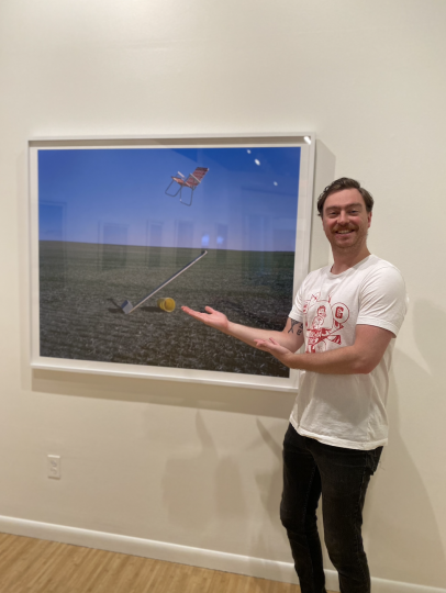 Game night host presenting one of the artists works