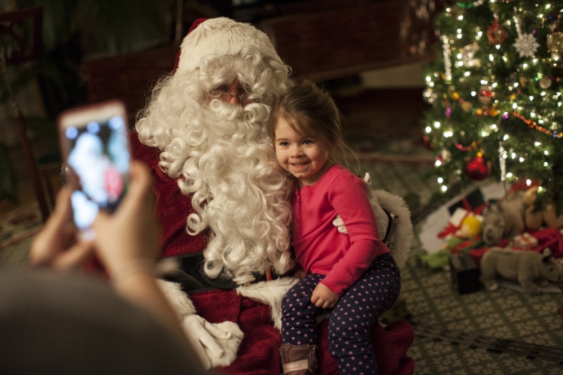 Photograph of Santa and child