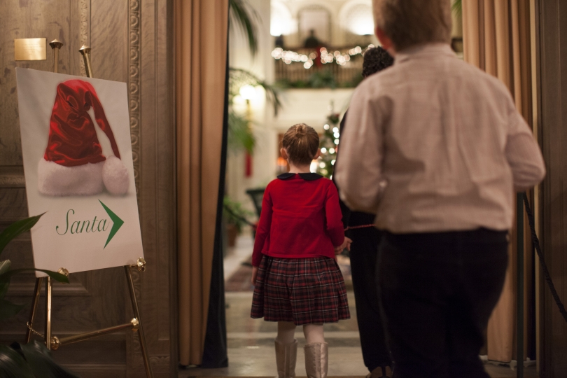 Photograph of Santa and child