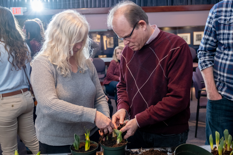 Two attendees of the Blooms & Brews event