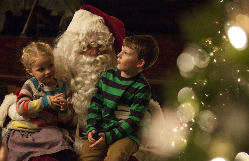 Photograph of Santa and child