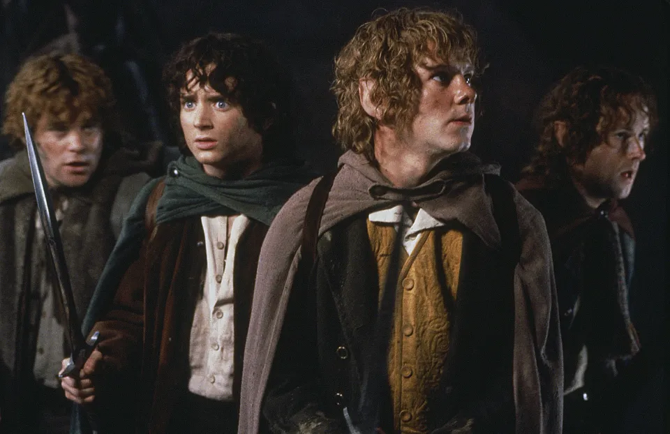 Samwise Gamgee (Sean Astin) far left, Frodo Baggins (Elijah Wood) left, Merry Brandybuck (Dominic Monaghan) right, and Pippen Took (Billy Boyd) far right in"The Lord of the Rings: The Fellowship of the Ring" (2001)