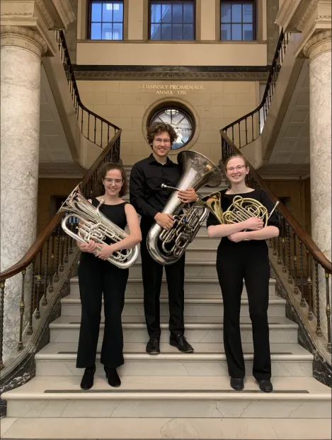 Their group is known as Minus 2 and consists of a French horn player, a euphonium and a tuba.