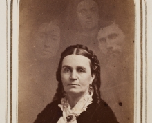 Woman with three ghostly heads surrounding her
