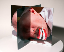 Lucas Blalock (b. 1978), Film-Object (Mouth), 2025 (detail), from Tête-à-tête-à-tête-à-tête-à-tête. UV-cured inkjet prints on Dibond, motorized turntable display. Courtesy of the artist.