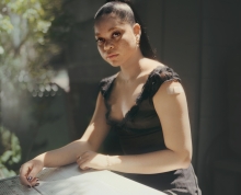 Portrait of a woman sitting outside