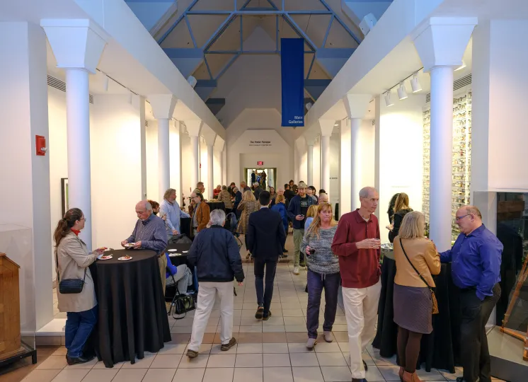 An exhibition opening in the Potter Peristyle of the George Eastman Musem