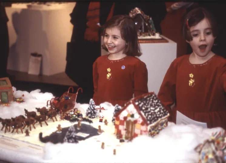 Children from 2002 looking at gingerbread