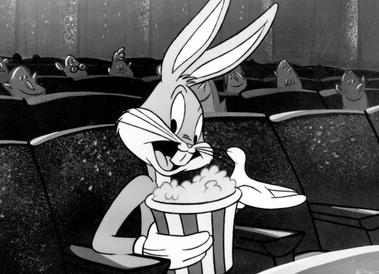Bugs Bunny sitting in a movie theater