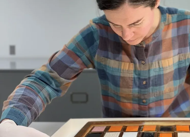 Emily Phoenix working on the object she will discuss in her talk.