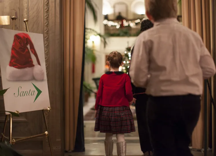 Photograph of Santa and child
