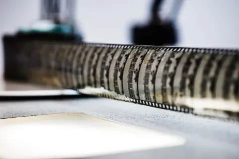 Nitrate film being wound through