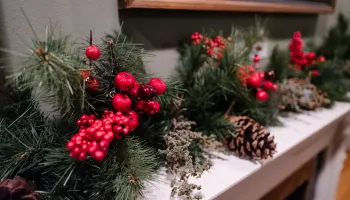 Holiday mantle with pine and berries 