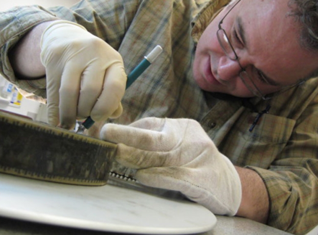 Students inspecting a print